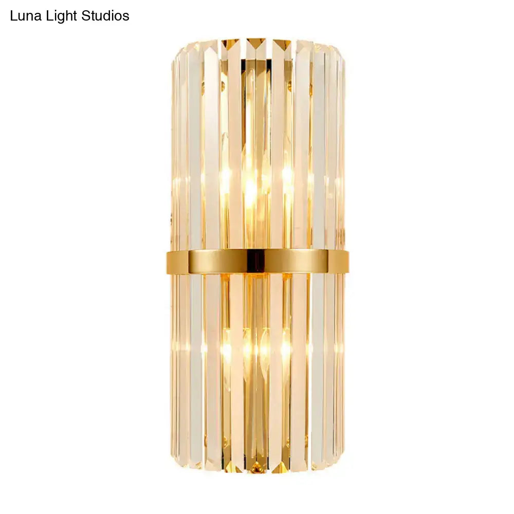 Elegant gold modernist cylinder wall lighting with vertical clear crystal rods and central brass band wall lighting fixture