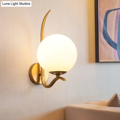 Modernist gold sconce light with white frosted glass globe and curved metal arms for bedroom 220v-240v