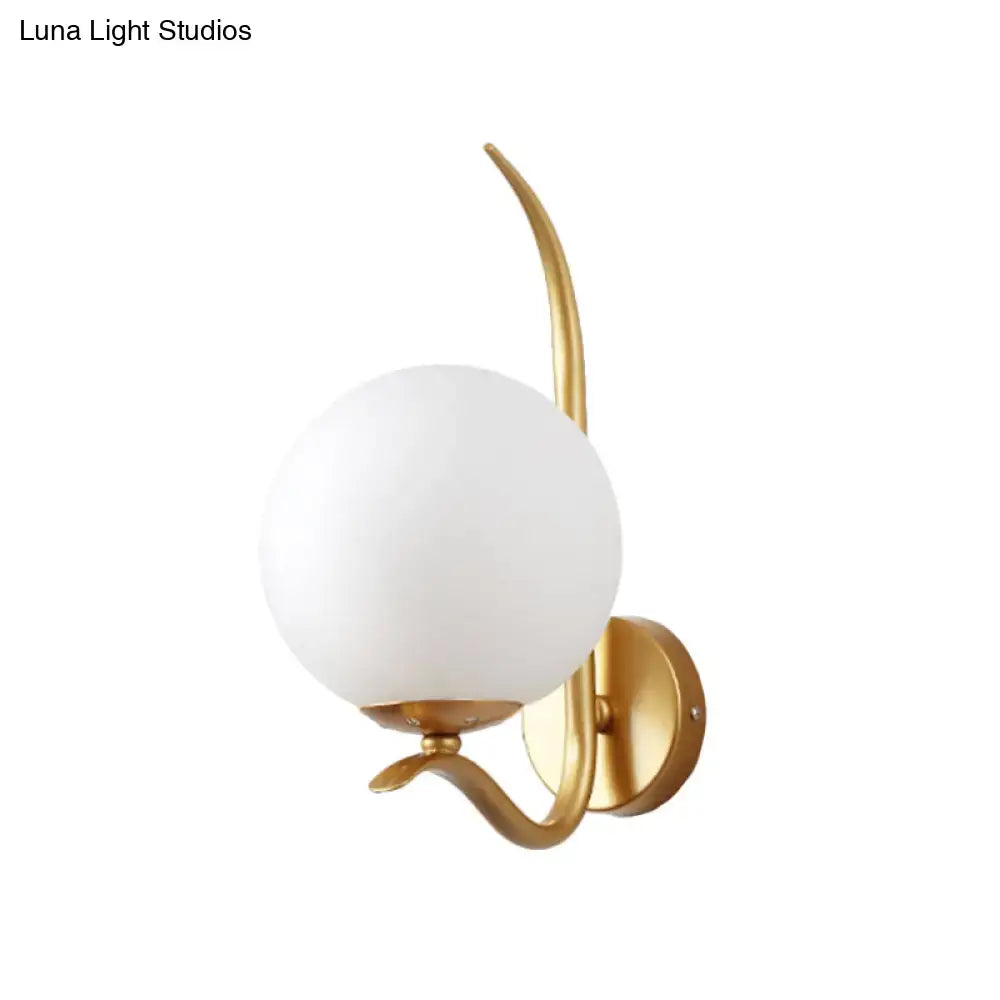 Modernist gold-toned sconce light with smooth opaque white glass shade for bedroom 220v-240v use