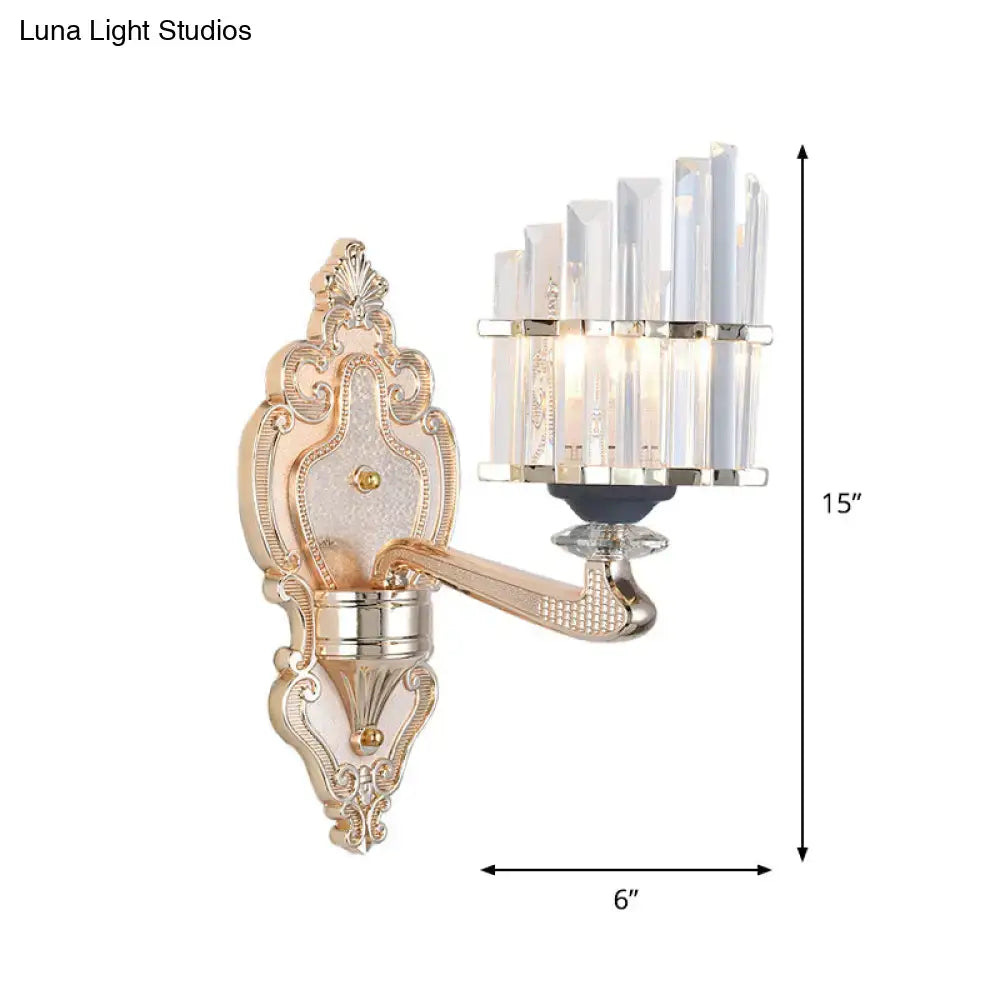 Gold-toned ornate wall light with crystal-encrusted arm and conical shade wall light for living room use