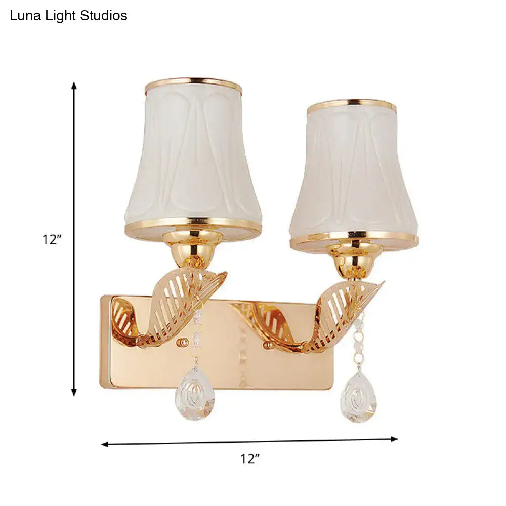 Gold finish double-arm wall light with frosted opal glass shades and crystal drop suitable for 220v-240v 110v-120v use