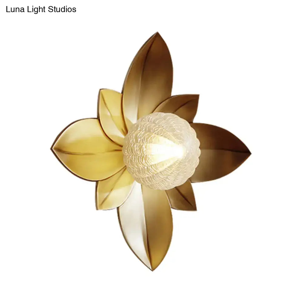 Modernist gold flower light fixture bedroom wall sconce with a golden lotus shape and textured frosted glass center