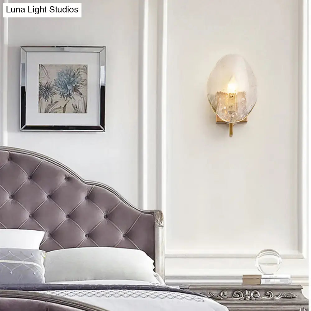 Elegant gold-toned modernist wall lamp with a translucent bubble-like glass shield for e12 e14 bulb use