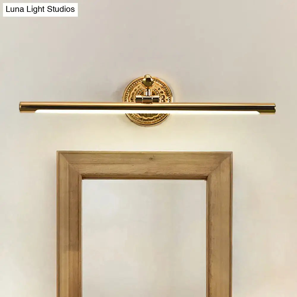 Modernist gold linear metallic vanity wall light with ornate circular backplate and sleek bar-style design
