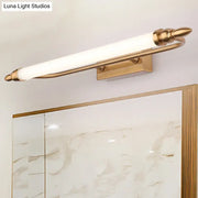 Modernist gold tube metal vanity wall light with frosted glass tube and ornate decorative ends for bathroom use
