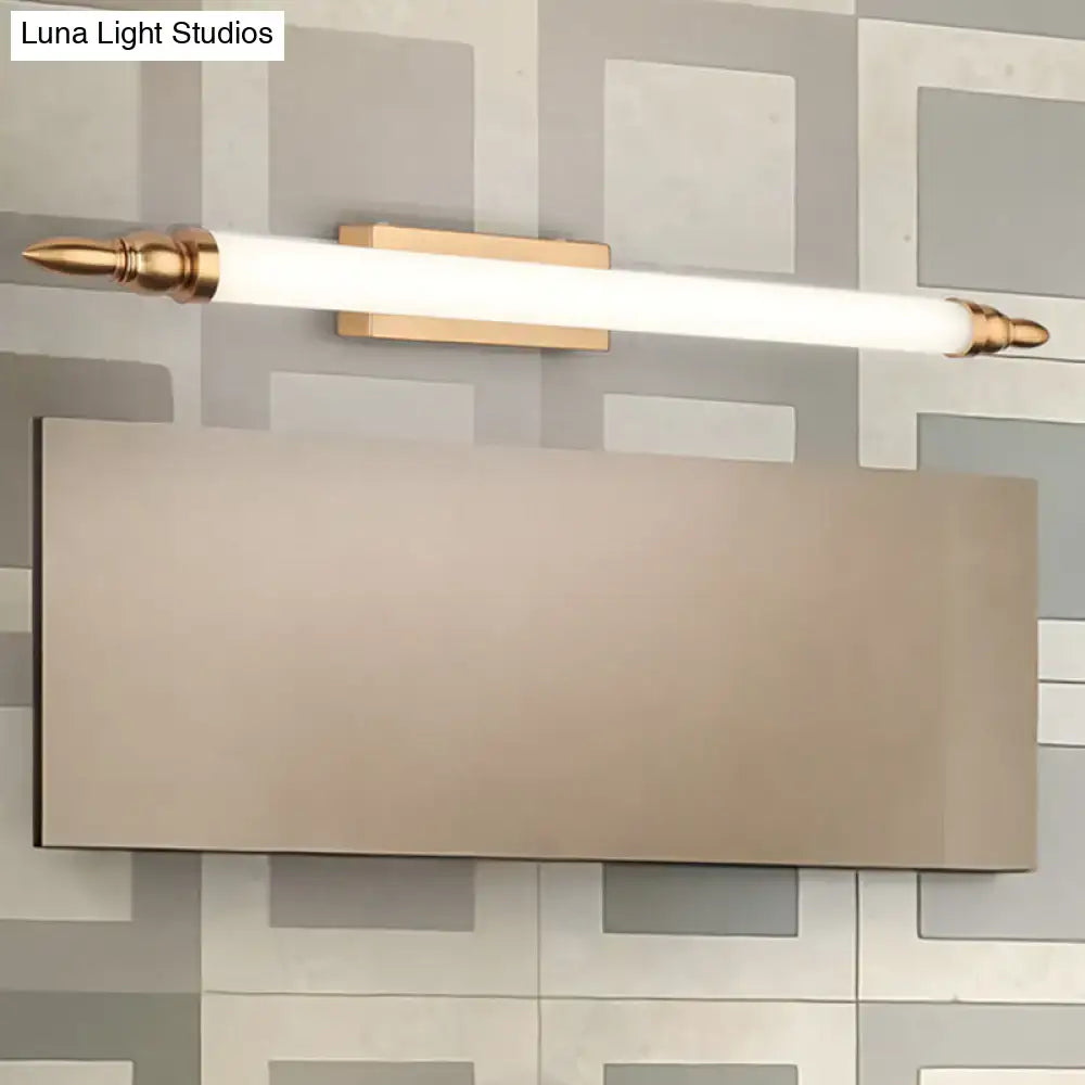A sleek modernist gold tube metal vanity wall light fixture with brushed brass base and gold-toned finials