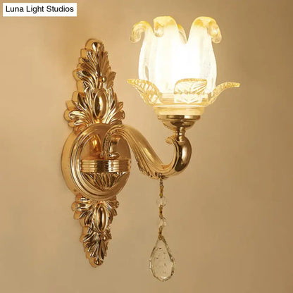 Modernist gold wall sconce with direct wired electric glass shade and crystal teardrop for living room lighting