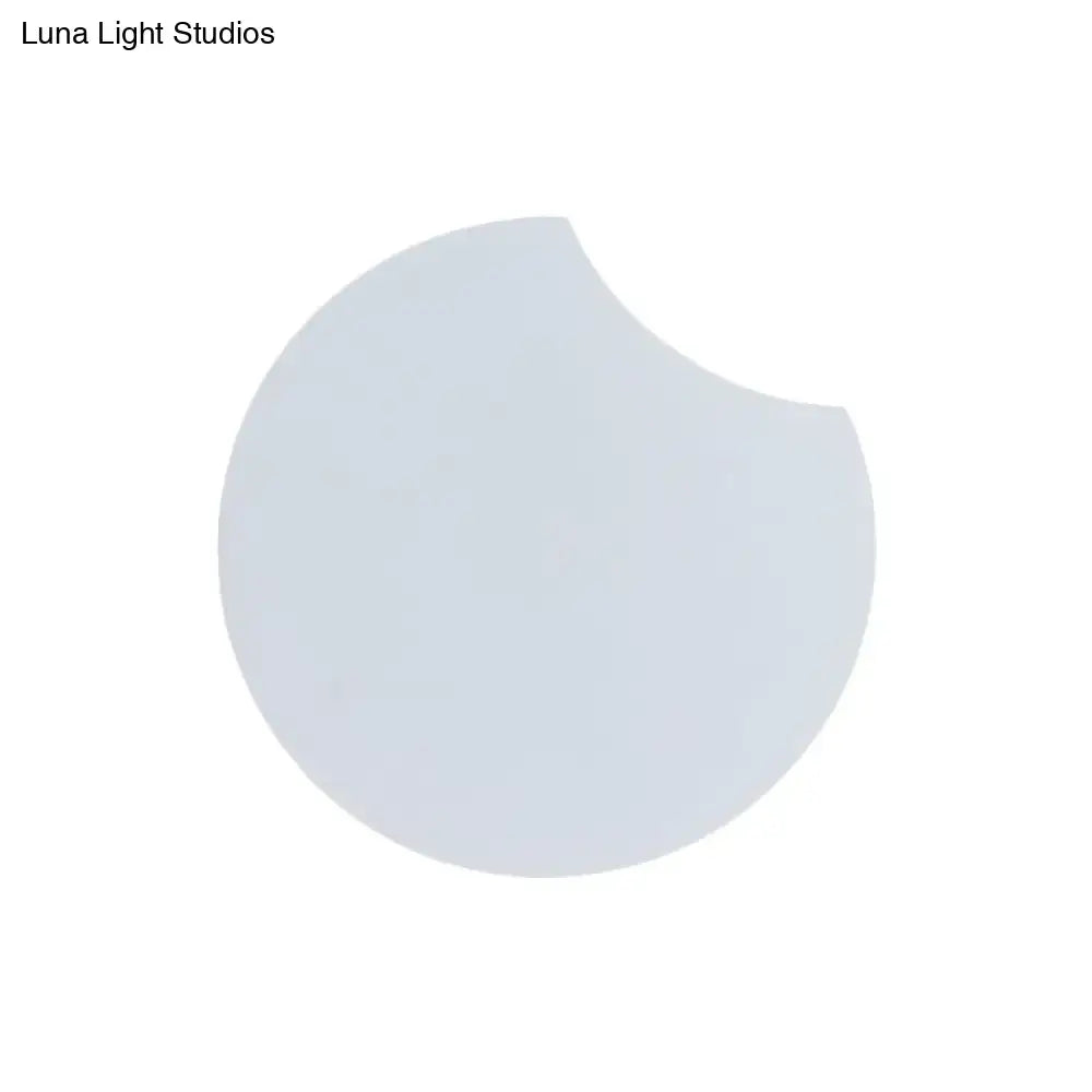 Modernist gray circular wall mount light with pale blue crescent shaped smooth glossy surface for bedroom use