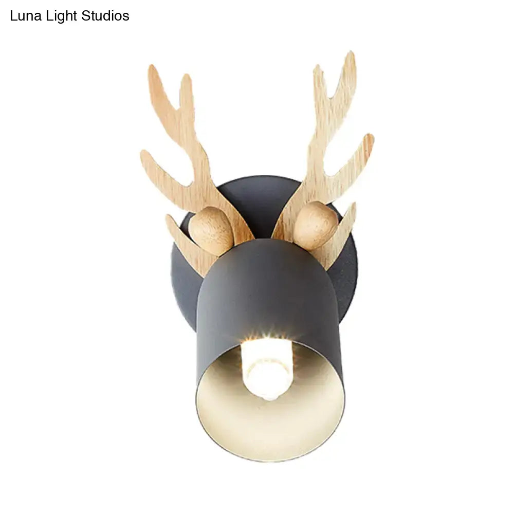 A rustic deer-head wall sconce with light wooden antlers and matte black cylinder shape shade for 110v-120v or 220v-240v use