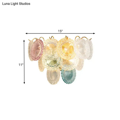 Pastel-colored glass chandelier with lace-like texture and gold hardware for dining room layered disc wall light