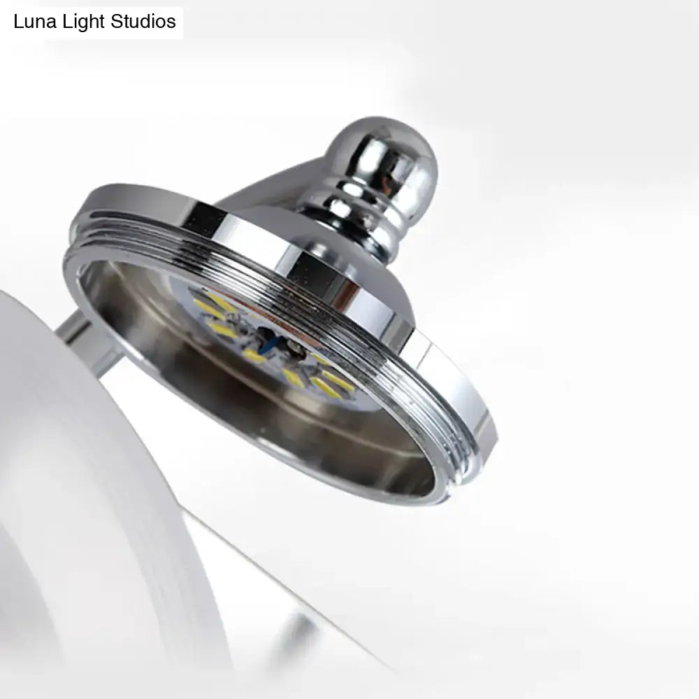 Modernist silver bathroom vanity light with frosted acrylic shades and chrome-finished led desk lamp head with visible diodes