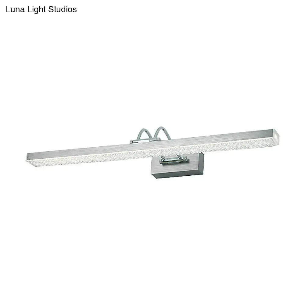 Modernist wall light with silver finish led vanity light featuring textured frosted glass and sleek metal bracket for bedroom use