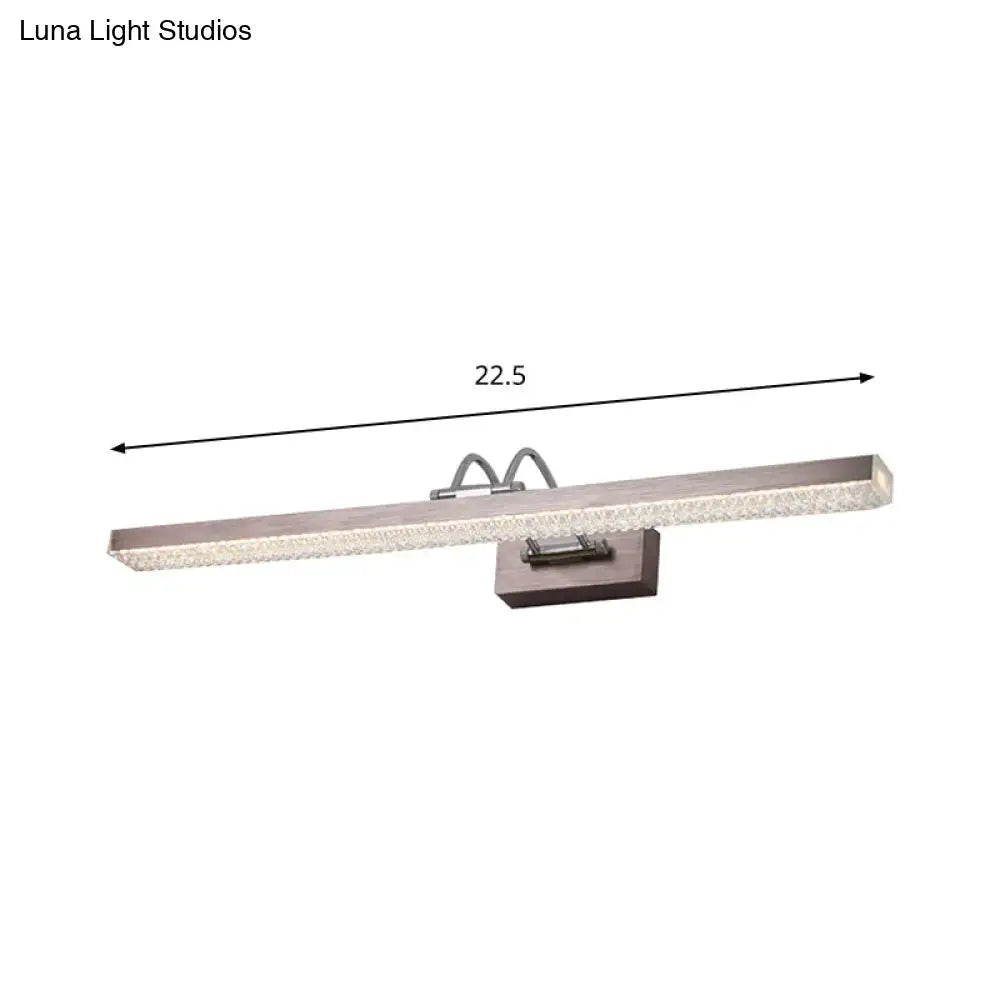 Modernist wall light featuring a brushed nickel led vanity light with crystal-encrusted textured rectangular design