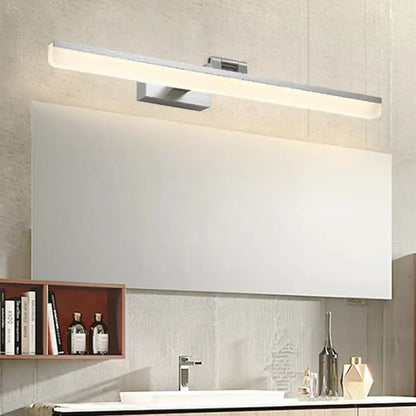 Modernist wall light with silver finish crystal led detail and soft white illumination for bedroom vanity use