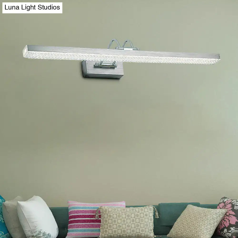 Silver rectangular modernist wall light with crystal led detail and textured surface for bedroom vanity sconce mounting