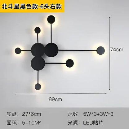 Black modern wall lamp from decorbites creative line featuring geometric star-like design with multiple circular led lights