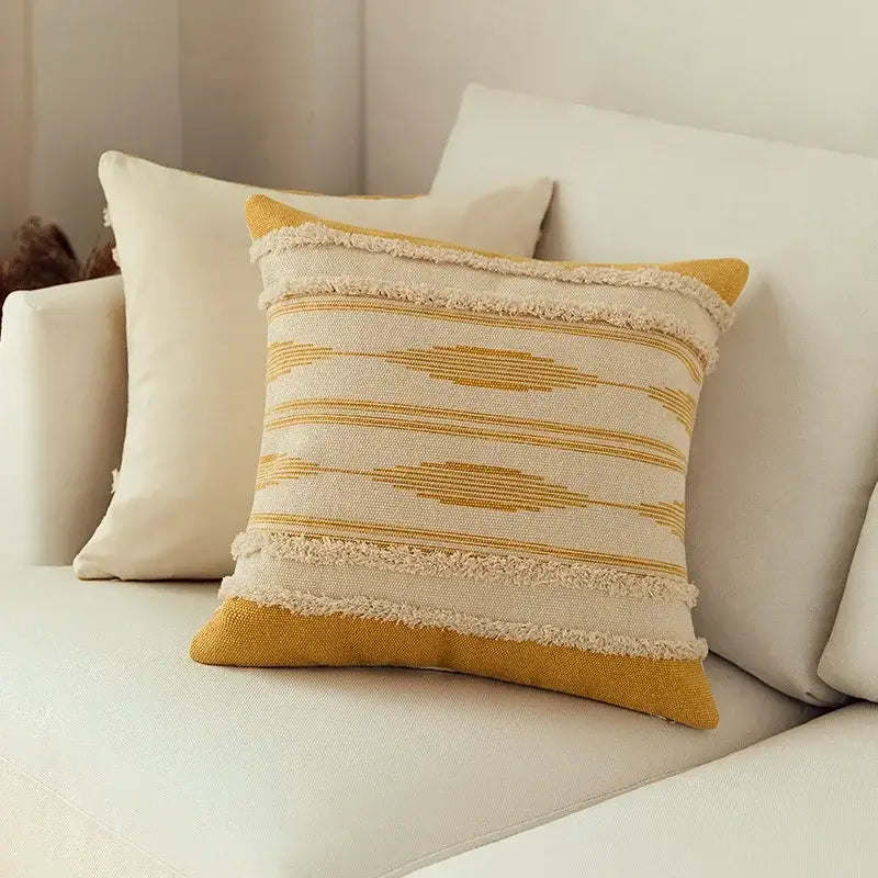 Cream and mustard yellow woven cushion cover set with frayed edge detailing for Moroccan geometric living room decor