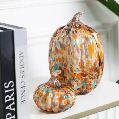 Vibrant multicolored mosaic orange and teal transparent glazed pumpkin sculpture with glossy finish and metallic stem for home decor