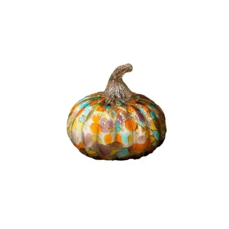 Decorative mosaic pumpkin sculpture with transparent glazed orange and teal tiles and a glittery textured stem for home decor