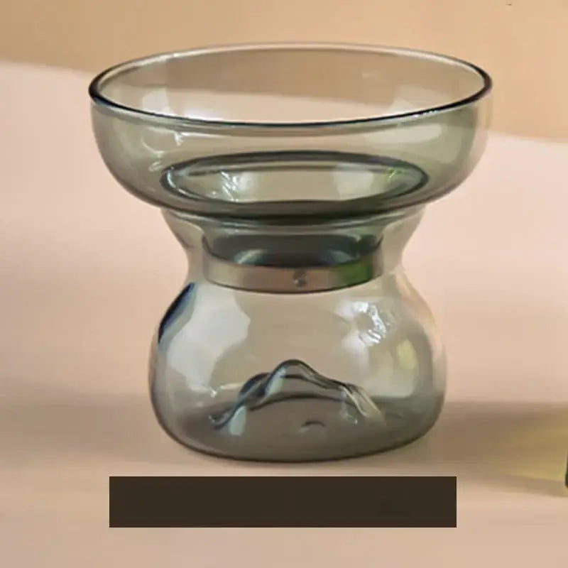 Mountain base glass tea cup set features a translucent gray glass oil burner with a sleek modern design