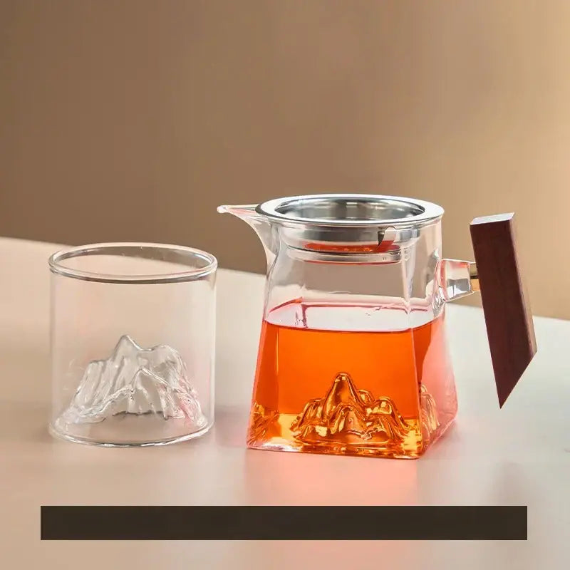 Clear glass tea cup set with wooden handle silver lid and mountain design base for dining room filter use