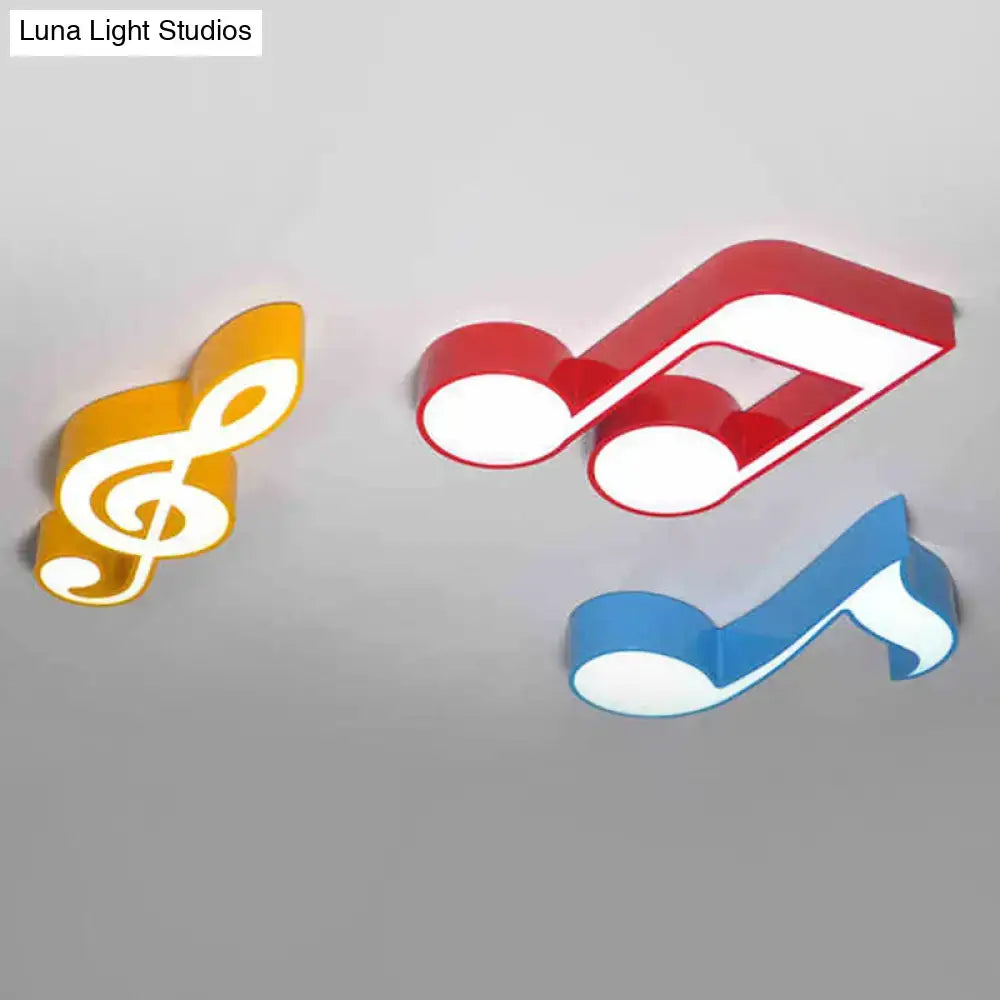 Set of three colorful modern acrylic musical note led ceiling lights in red blue and yellow for kindergarten use