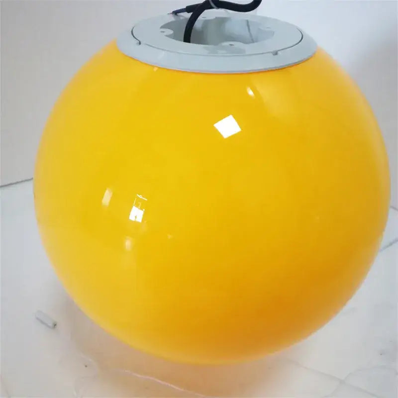 Bright yellow spherical balloon ceiling lamp with glossy finish and gray base from kids nursery set of 5 ceiling lamps