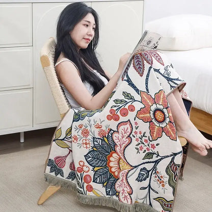 A cozy cream-colored decorbites gauze flower bath towel with vibrant multicolor floral pattern for bedroom decor