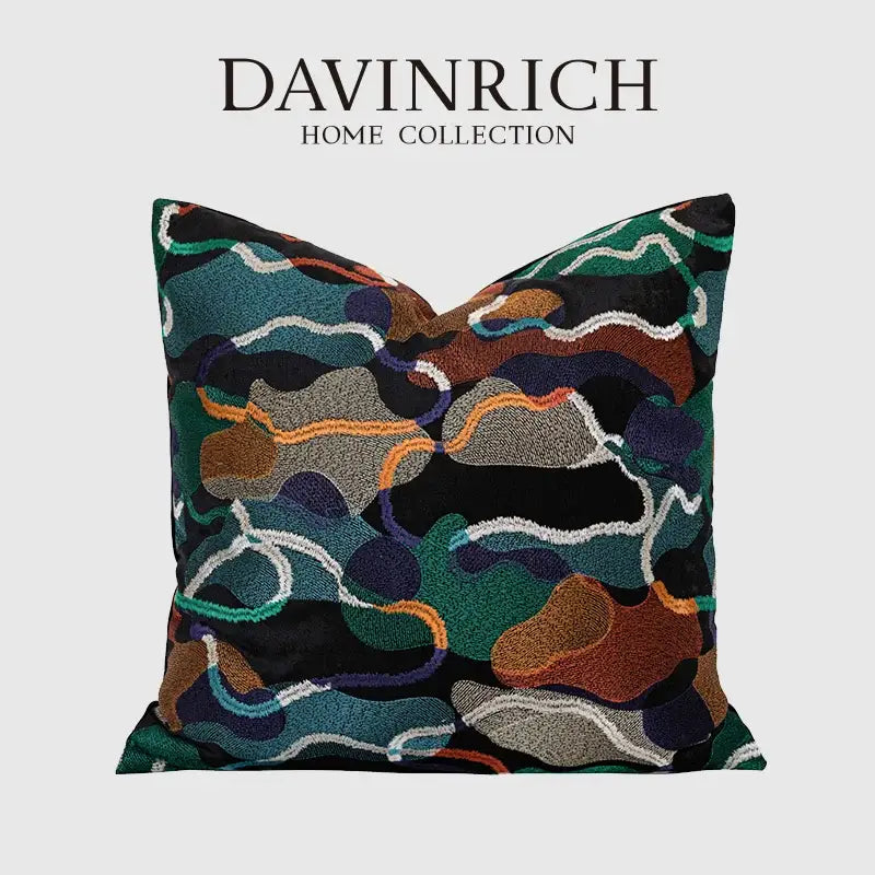 Multicolor geometric embroidery abstract cushion cover with bold teal orange brown swirls on black for living room decorbites