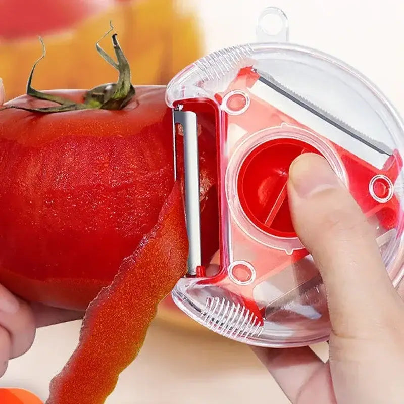 Red and clear plastic magic peeler with retractable stainless steel blade from multicolor magic peeler trio set for kitchen use
