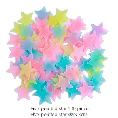 A collection of 100 pastel multicolor stars glow dark wall stickers in pink blue green and yellow for luminous bedroom decor