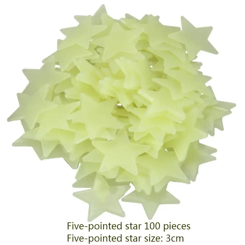 A pile of 100 pale yellow five-pointed stars glow dark wall stickers for bedroom luminous decor