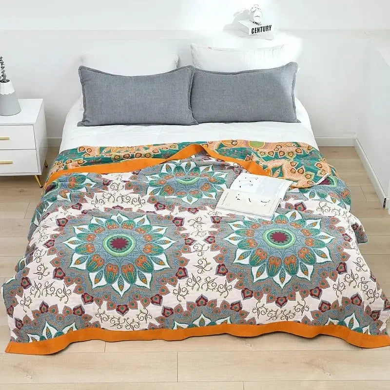 Multicolored cotton gauze boho throw blanket with teal orange mandala patterns and vibrant orange border for decorbites cotton gauze decor