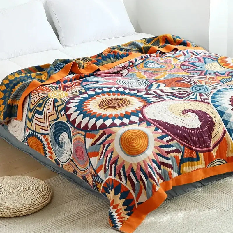 Multicolored cotton gauze boho throw blanket with geometric and spiral patterns for bedroom or living room decorbites cotton gauze