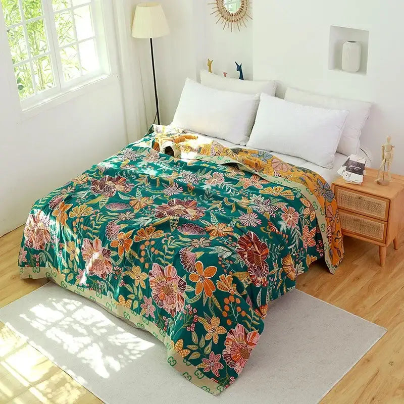 Multicolored cotton gauze boho throw blanket with vibrant green floral design and soft textured weave for bedroom decorbites cotton gauze