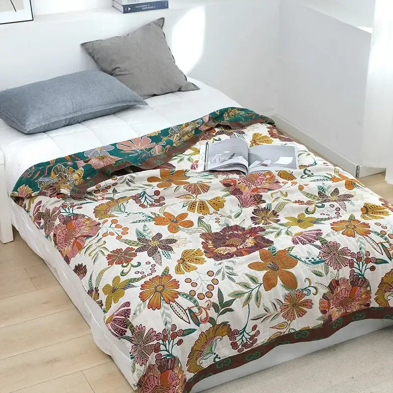 Cozy cream-colored quilted multicolored cotton gauze boho throw blanket with vibrant floral pattern for living room decorbites cotton gauze