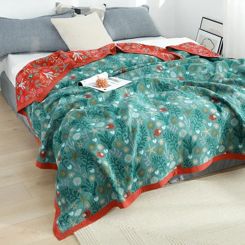 Cozy teal and red cotton gauze boho throw blanket with plush marine designs for bedroom or living room decorbites cotton gauze