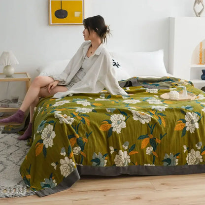 Olive green floral decorbites cotton gauze boho throw blanket with white and yellow blossoms and dark gray border
