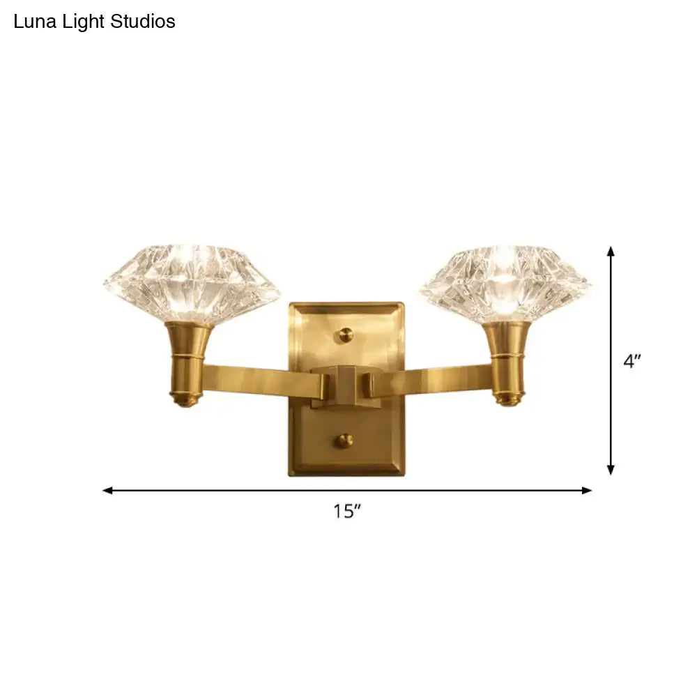 Brass-finished mussel wall mounted lamp with two crystal diamond-shaped shades for bedroom or doorway wall lamp use