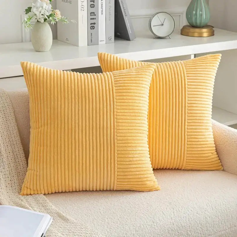 Pair of mustard yellow decorbites corduroy striped pillow covers with vertical ribbed texture for living room decor