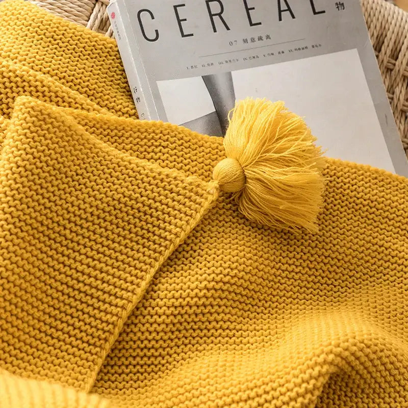 Mustard yellow knit pompom tassel throw blanket with fluffy tassel accent for cozy bedroom decorbites knit pompom style