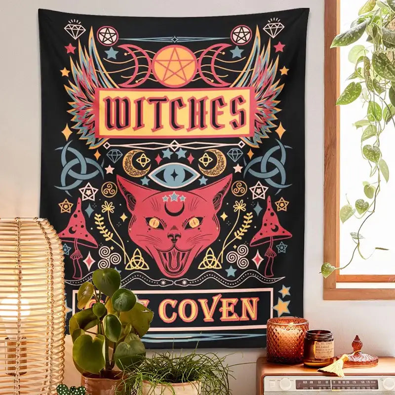A vibrant black cat witchcraft tapestry featuring a central pink cat with golden eyes and mystical symbols for bedroom decor