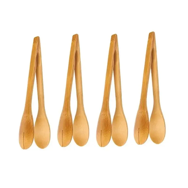 Set of four natural bamboo kitchen food tongs with smooth light brown finish and tapered handles for salad use