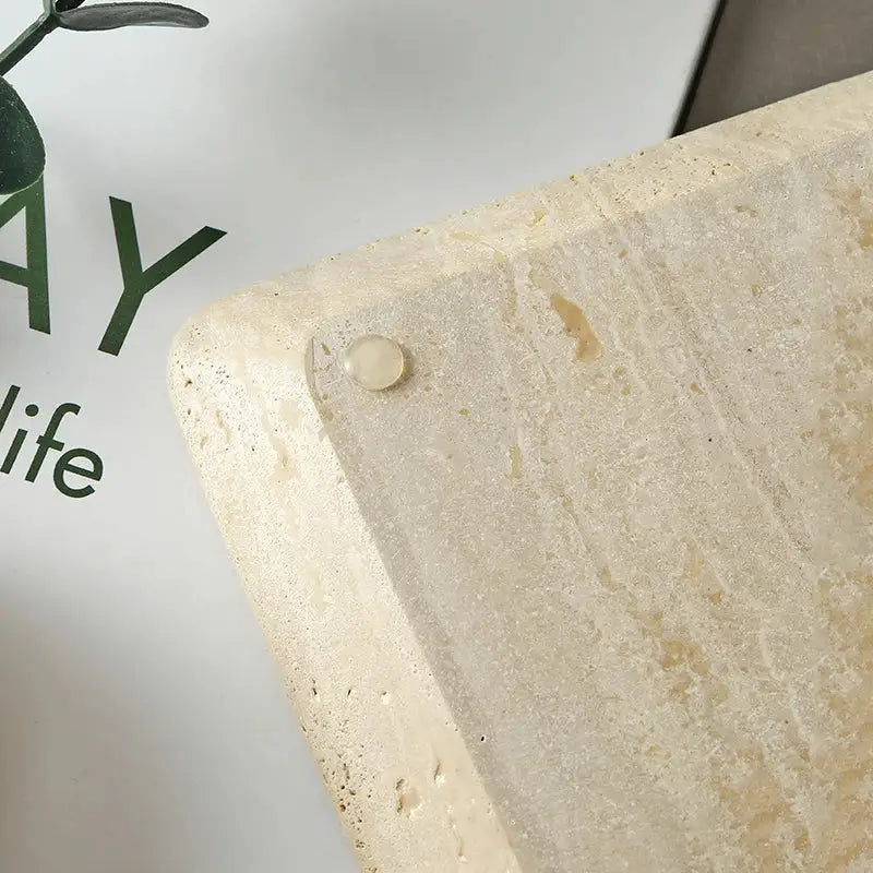Beige travertine marble natural stone tray with textured surface and rounded edges for kitchen and bathroom use