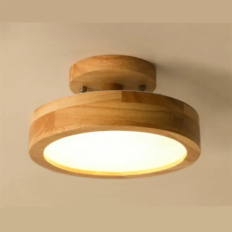 Warm-toned natural circular wood ceiling lamp with visible grain for living room decorbites circular wood lighting