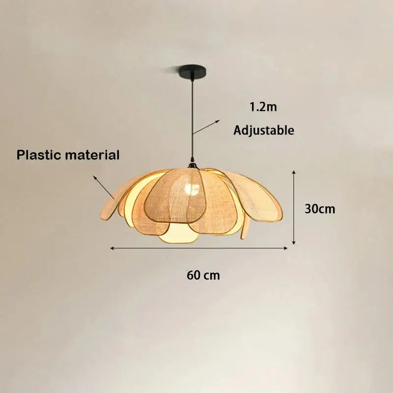 Natural rattan pendant light with warm-toned layered petal-shaped shades as a light source for dining room decor