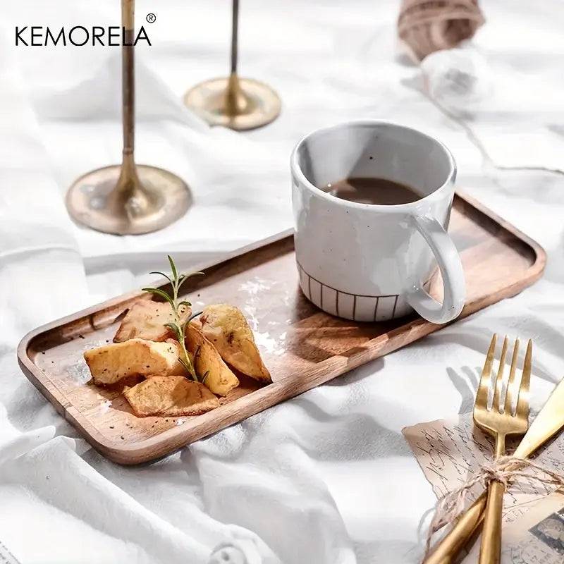 Natural two-tone acacia wood coffee tray with raised edges holding a white ceramic mug by decorbites acacia wood