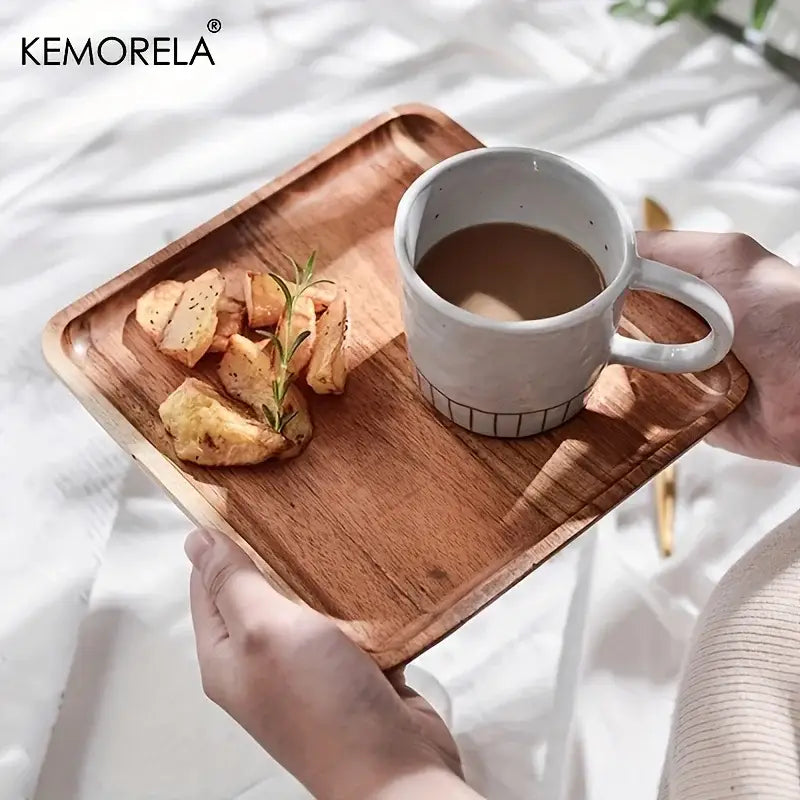 Natural two-tone acacia wood coffee tray with a ceramic mug and roasted potatoes by decorbites acacia wood