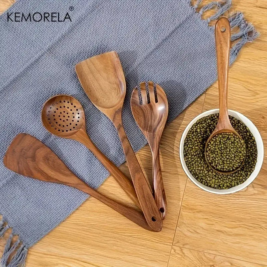 Natural wooden tableware set featuring five polished wood kitchen utensils with smooth surfaces and warm brown finish