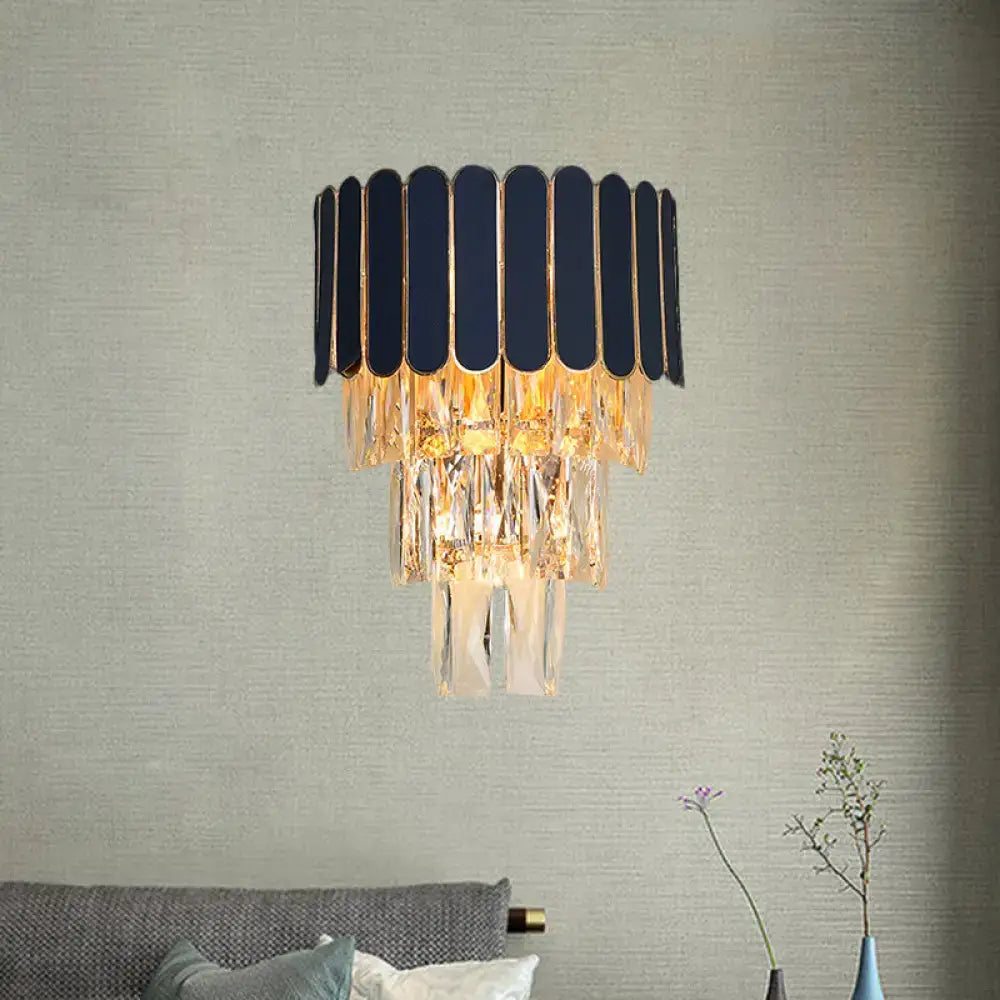 Elegant navy blue and gold rectangle-cut crystal wall sconce with cascading droplets for living room lighting idea